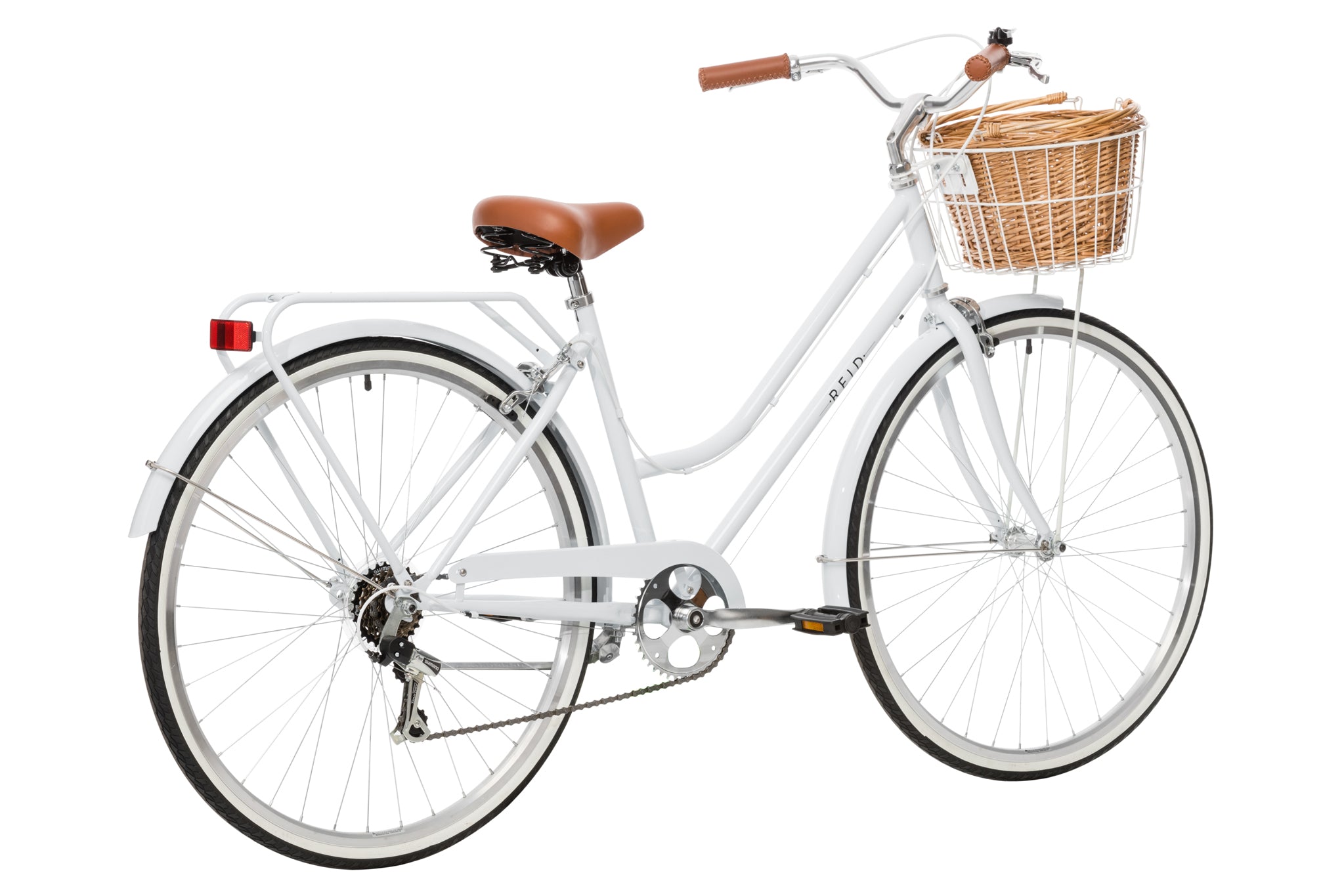 White vintage store bike with basket